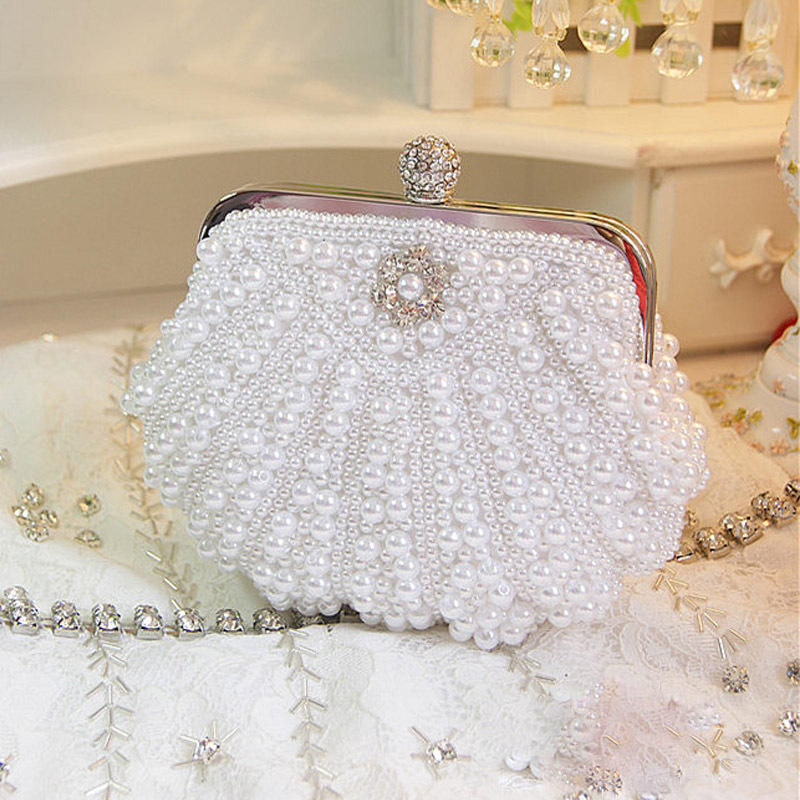 Luxury Scalloped Pearl Clutch  - Luxury Bags Direct recension och pris